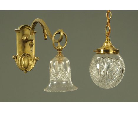 A Victorian brass wall light fitting, with cut glass shade, together with a brass and cut glass hanging lantern. CONDITION RE