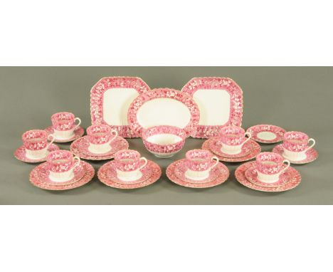 A Copeland late Victorian part tea service, printed borders of flowers against a red ground and with gilt rims, with scallop 