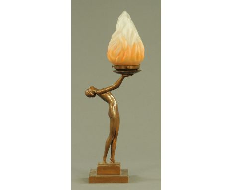An Art Deco patinated spelter table lamp, early 20th century, modelled as a young female standing upright on tiptoes her back