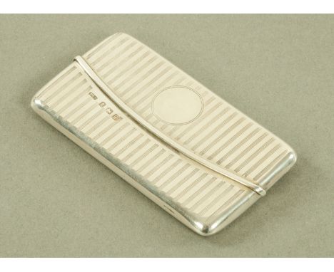 A small silver card case, William Hare Haseler, Birmingham 1915, of rectangular form with sprung hinged top and silver gilt i