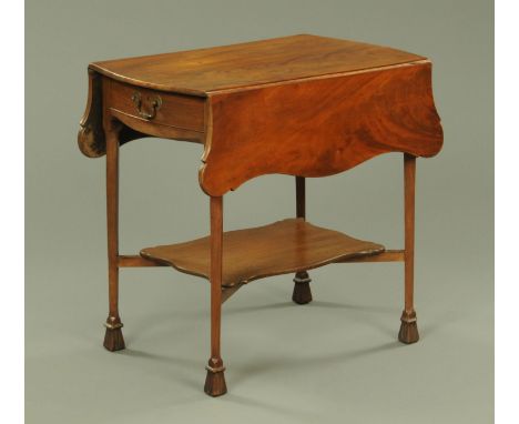 A 19th century mahogany Pembroke table, with butterfly wing flaps and raised on tapered legs of square section terminating in