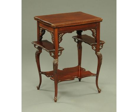 A late 19th century mahogany turnover top card table, having a shaped rim with a baize lined interior with tooled leather edg
