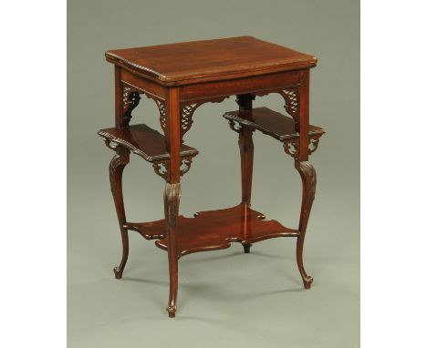 A late 19th century mahogany turnover top card table, having a shaped rim with a baize lined interior with tooled leather edg