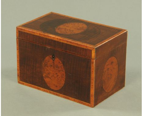 A George III inlaid mahogany tea caddy, with burr wood panels and crossbanded edge.  Width 23 cm. CONDITION REPORT: The tea c