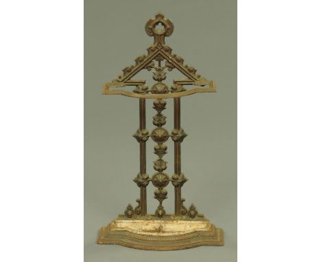 A Victorian Gothic inspired cast iron stick stand, with removable well, height 70 cm.