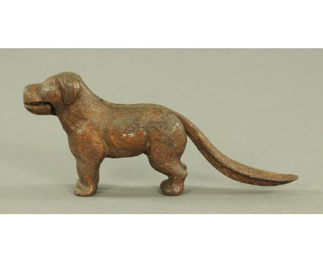 A brown painted cast iron dog nutcracker, Victorian.  Length 22 cm.