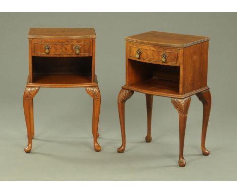 A pair of bedside cabinets, each with bowed front and single drawer with open aperture and raised on cabriole legs terminatin