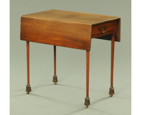 A George III mahogany Pembroke table, with end drawer and raised on tapered legs of square section terminating in toupie feet