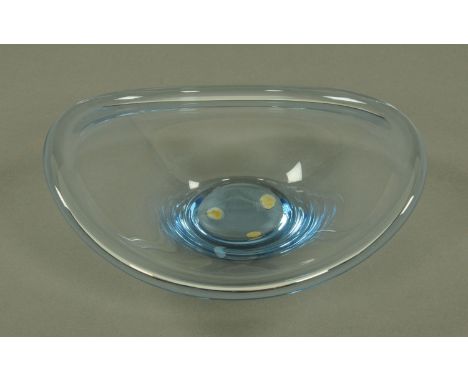 Per Lutken for Holmegaard, a biomorphic shaped dish, circa 1962, having a light blue tinge throughout, engraved marks to the 