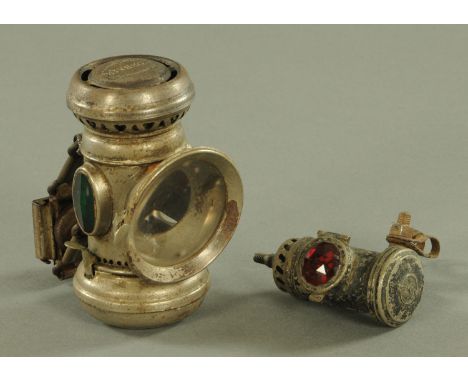 A vintage Powell &amp; Hanmer "Corsair" motorcycle lamp, and a Lucas No. B116 rear light.  12.5 and 9 cm respectively. 