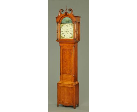 An oak longcase clock, 19th century, the painted arched dial with subsidiary seconds and date dials, with eight day movement 