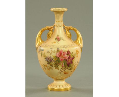 A Royal Worcester blush ground twin handled vase, shape No. 1683 date code 1910, decorated with floral sprays heightened with