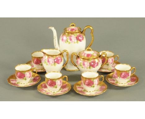 A Royal Albert six place coffee service, with printed rose decoration against a gilt ground, comprising coffee pot, sucrier, 