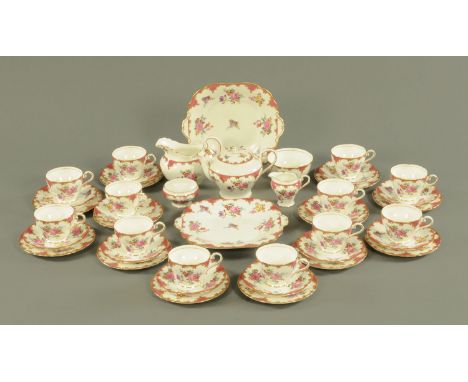 An Aynsley porcelain twelve place tea service, pattern number B971, comprising 12 cups, saucers and side plates, milk jug, su