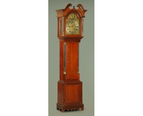 An Edwardian mahogany longcase clock, the dial inscribed Maple and Co Limited London, the swans neck pediment and arched silv