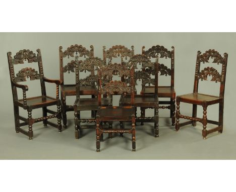 Eight Derbyshire/Yorkshire carved oak chairs, late 17th century and later, seven single and one carver arm, with double carve