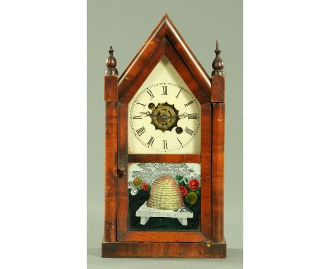 A 19th century American alarm mantle clock, with glass panel decorated with a beehive.  Height 37 cm, width 19 cm. 