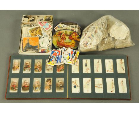 A large quantity of cigarette cards, to include a Wills album of flowers, allied army leaders and insect, and others by senio