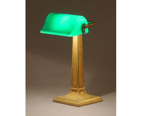 A vintage brass desk lamp, with green glass shade, bearing label "Greenalite".  Height 48 cm, width 27 cm.  CONDITION REPORT: