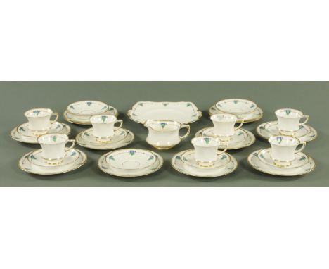 A Paragon part tea service, early 20th century, each decorated with green and blue enamel pendants with gilt lined borders ag