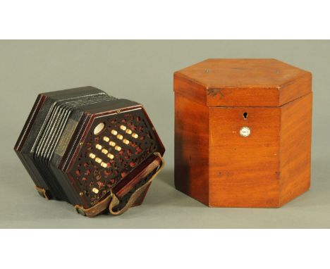 A 19th century Lachenal and Co 31 button accordion, with fretwork ends and with applied paper label for Lachenal & Co manufac