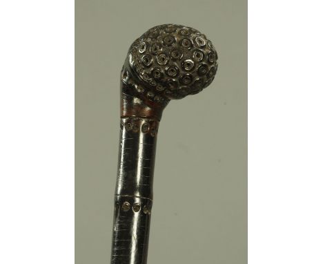A bamboo root bulb walking stick, 19th century, the root bulb forming the grip on a tapering shaft.  90.5 cm high. 