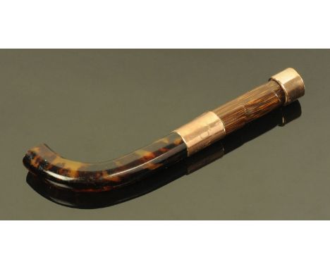 The upper section of a simulated tortoiseshell and bamboo Victorian walking stick, with 9 ct gold silver mounts.  17.5 cm. 