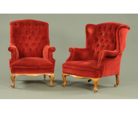 A pair of Victorian red upholstered button back armchairs, with horsehair and sprung interiors all upon short cabriole legs. 