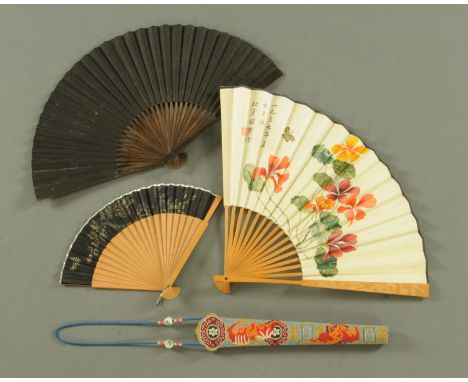 A Chinese hand painted fan, mid 20th century, the carved bats decorated with a deer amongst blossoming prunus, the other with