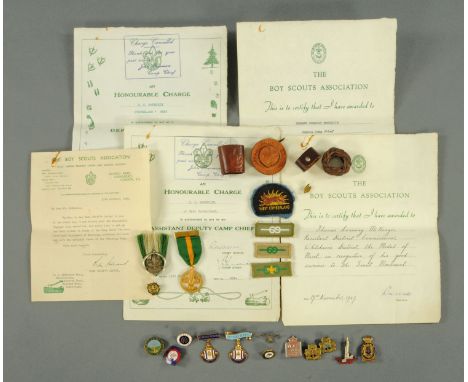 Of boy scout interest - a gilded medal dated verso 19/11/47, and inscribed T C McKenzie, a silver boy scout sporran form badg