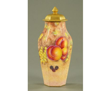 A Royal Worcester hexagonal shaped vase and cover, decorated in the fallen fruits pattern, signed G Delaney, black printed ma