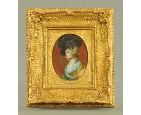 A portrait miniature of a lady, dressed in the fashions of the late 18th century, mounted oval within a gilt frame with shell