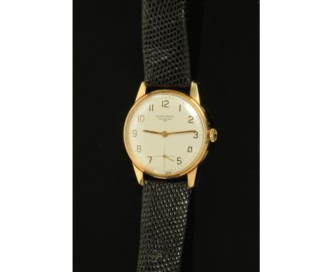 A gentleman's 9 ct gold cased Longines wristwatch, 1976, the dial with Roman numerals and subsidiary seconds hand, in origina
