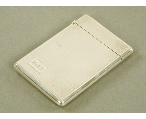 A silver card case, Deakin and Francis Limited, Birmingham 1932, with engine turned decoration and rectangular cartouche engr