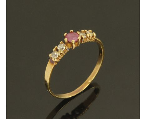 A 14 ct gold ruby and diamond dress ring, size Q.