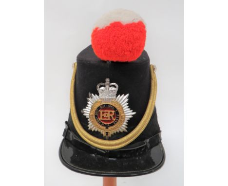 Post 1953 Royal Corps of Transport Dress Shakodark blue shako with lower black, oak leaf braid.  Black patent peak and chinst