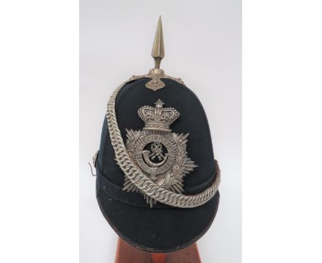 Victorian Volunteer Light Infantry Other Ranks Home Service Helmetblack melton cloth, four panel crown.  Rounded front peak a