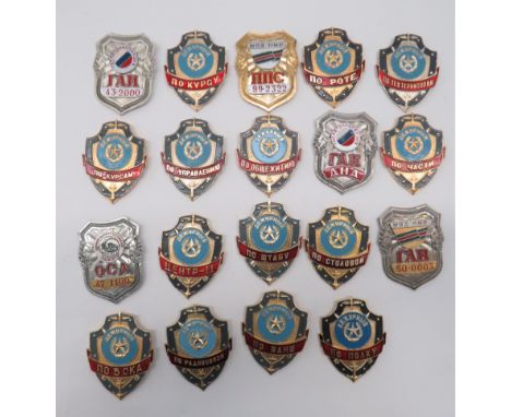 Russian Police & Army Shieldsincluding 5 x gilt, plated and painted numbered breast shields ... 14 x gilt and enamel Army Dut
