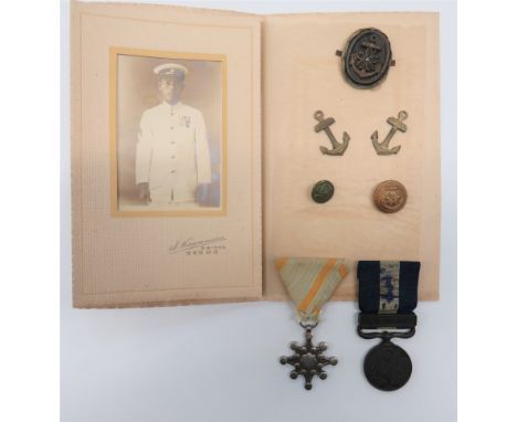 Interesting Japanese Naval Medal Groupconsisting Sacred Treasure 8th Class ... 1914-20 War medal.  Together with a photo of t