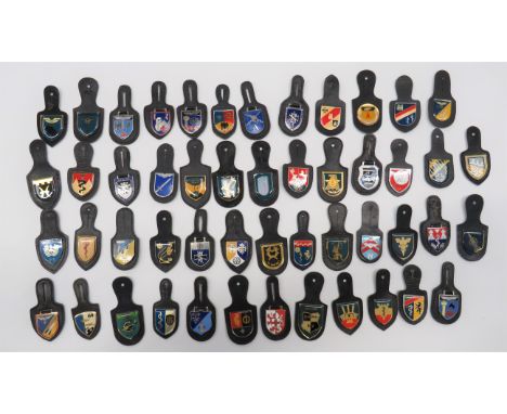 Post War West German Bundeswehr Breast Tabsgood selection of chrome, gilt and enamel badges on leather breast tabs including 