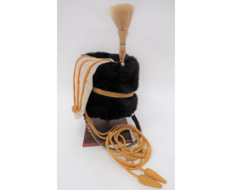 Cavalry/Yeomanry Band Busbyblack fur, short body with yellow cord lines.  White busby side bag with yellow piping and lower b