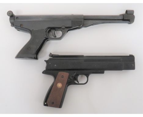 Gamo (Spain) Air Pistol.177, 7 inch, fixed, blued barrel with rear, swing out, loading gate.  Hooded front sight.  Lower load