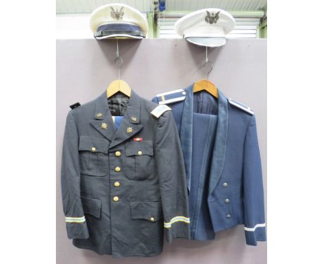 Two American Dress Uniformsconsisting Air Force blue, mess jacket.  Embroidery, Lieutenant shoulder boards.  White metal butt