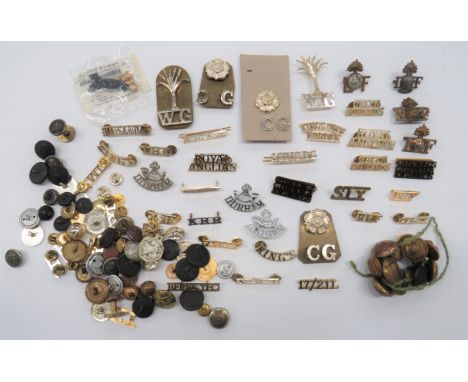 Shoulder Titles and Various Buttonstitles include brass SIY ... Brass NF with grenade ... Bi-metal Royal IF with grenade ... 