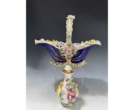 A Coalport porcelain floral encrusted basket, c.1830, 26cm long, together with a Spode porcelain floral encrusted scent bottl
