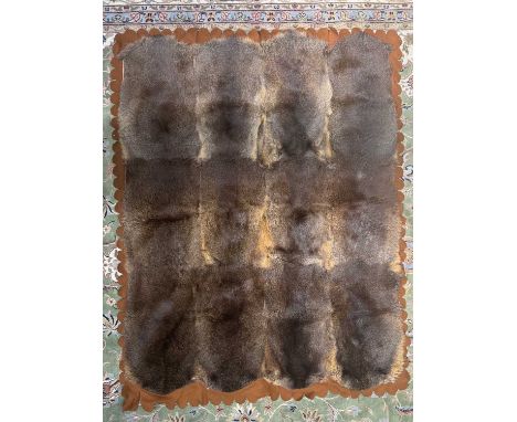 Large fur rug, deer/Cervidae taxonomic group, 12 pelts on felt backing, length 186cm, width 146cm, (1)