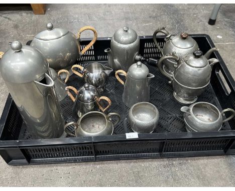 A late 20th century Nick Munro, pewter and stainless steel, English made, part teaset comprising of teapot, coffee pot, hot w