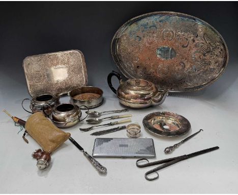 A hallmarked silver mounted wine bottle coaster, together with a silver tea spoon and napkin ring and silver plate, a teapot,