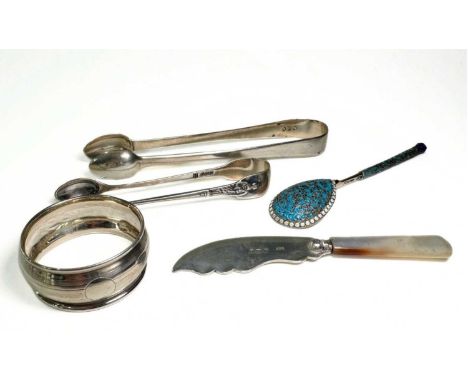A group of items, to include a single pair of George III silver sugar tongs, hallmarked London 1816, and another smaller twen