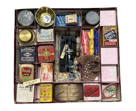 An Edwardian Toy Grocer`s Shop "Pets Stores", c.1910, the original cardboard box with pictorial lid lithographed with a boy a